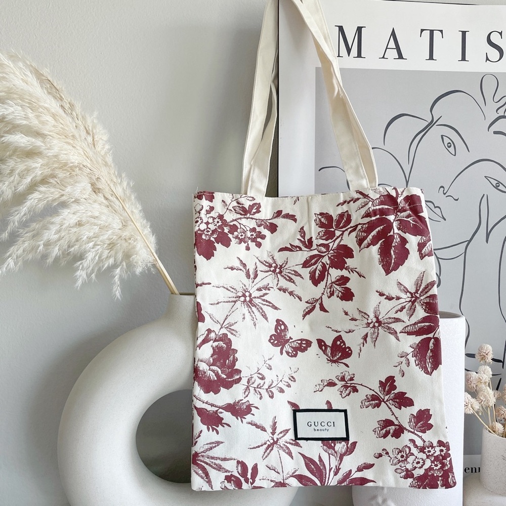 GUCCI FEMALE SATIN BLOOM POUCH